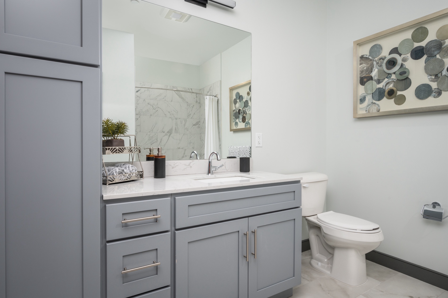 Model 1BR Bathroom with elegant fixtures