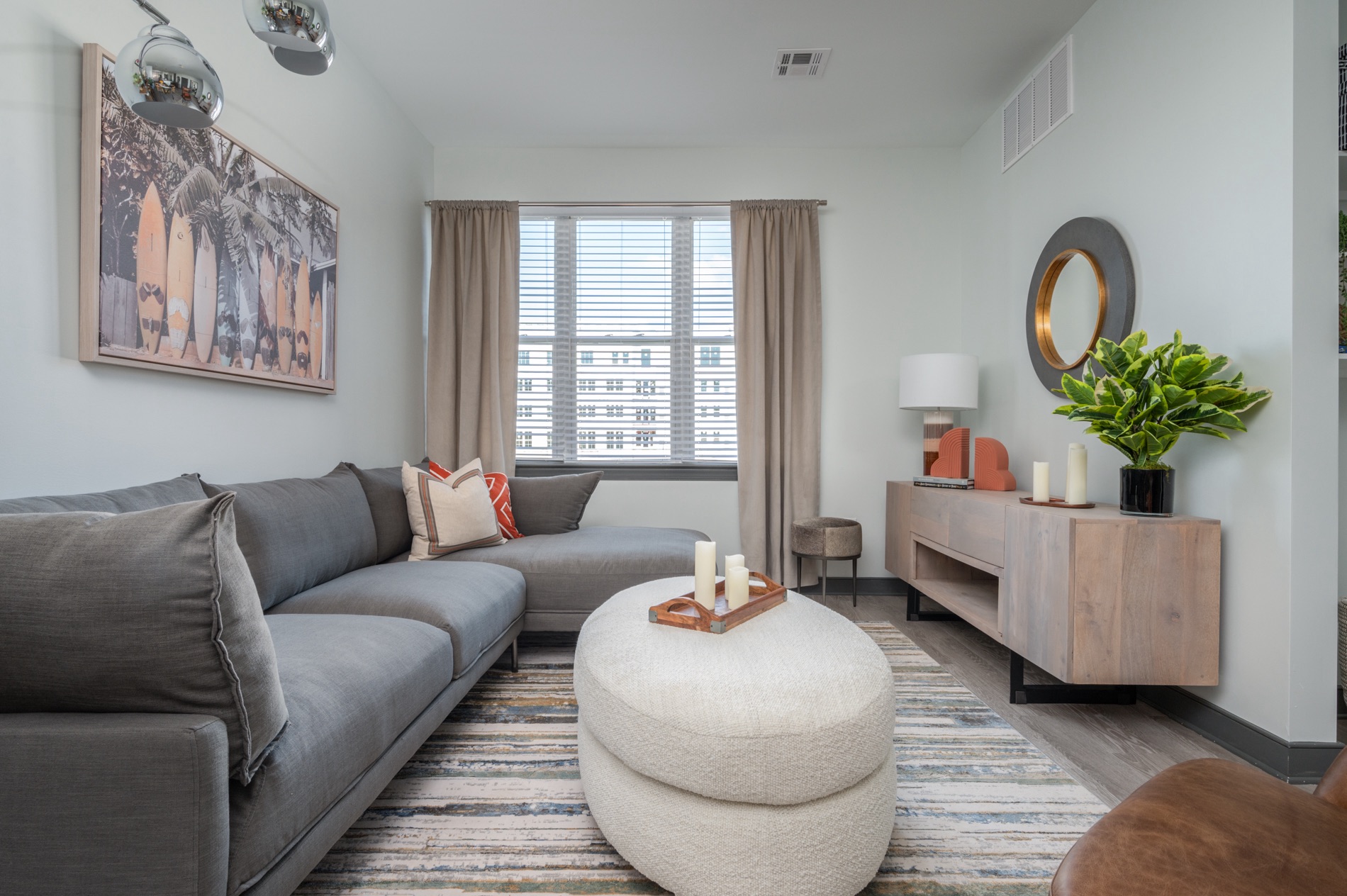 Model 1BR Living Room with natural light