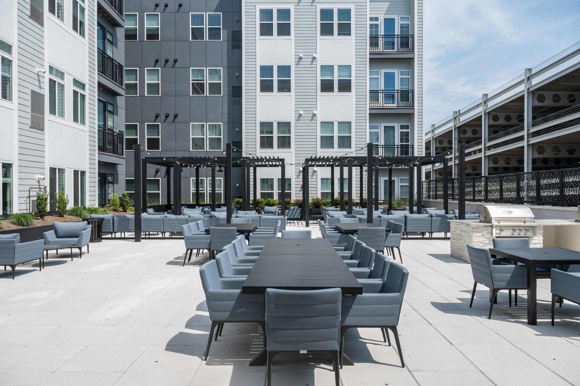 Comfortable outdoor seating area with tables.