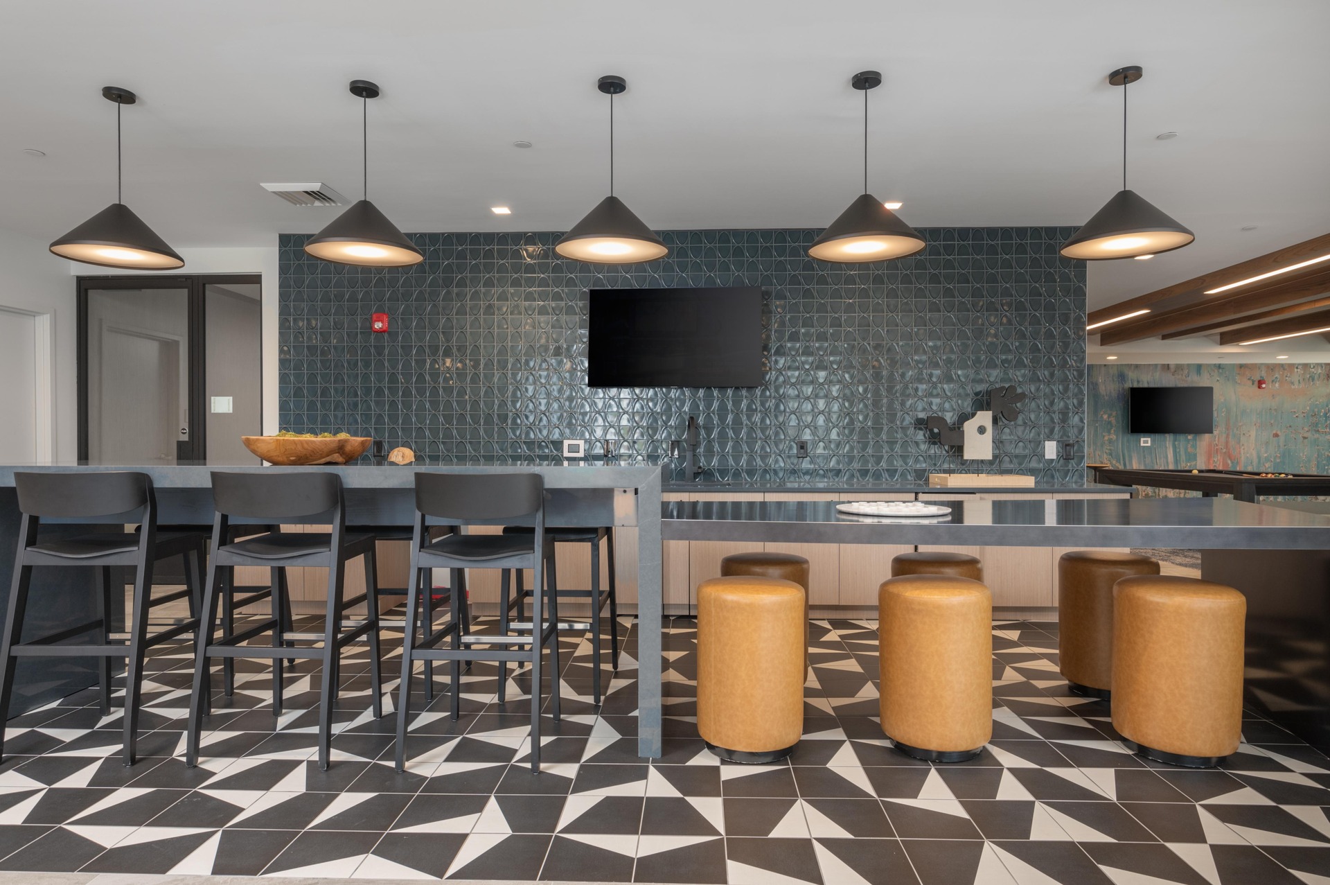Another view of the resident lounge with a chef's kitchen.